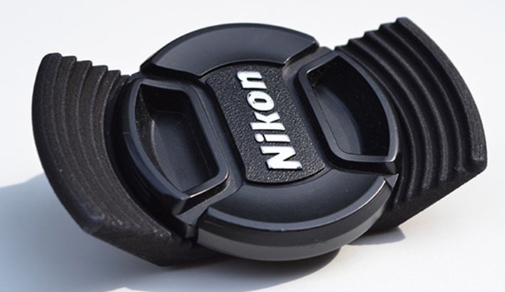 The Stow-Away Lens Cap Holder