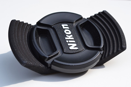 Stow-Away-Lens-Cap-Holder