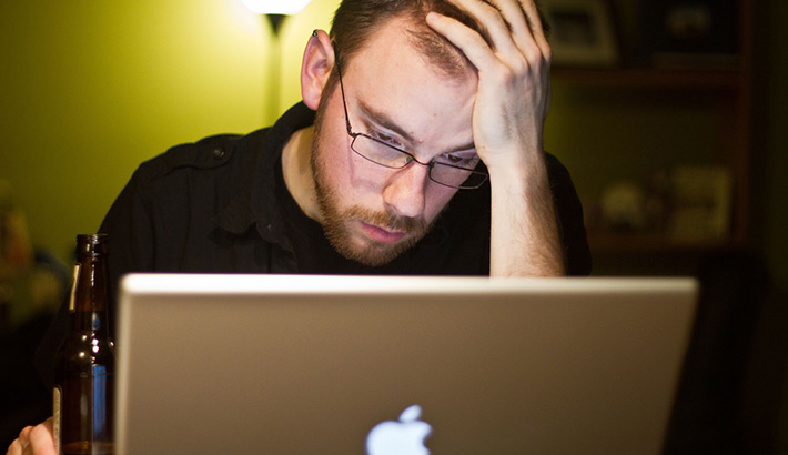 stressed-editing-photographer