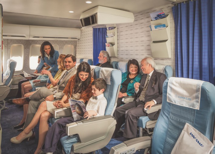 In the back, it's a slightly different story. Pan Am's clipper class was the fore-runner to the modern day premium economy class. Even with slightly more legroom than coach, it's not quite as roomy as the first class cabin up front. Even as a premium economy class, the seats are significantly thinner and smaller than what we're accustomed to today.