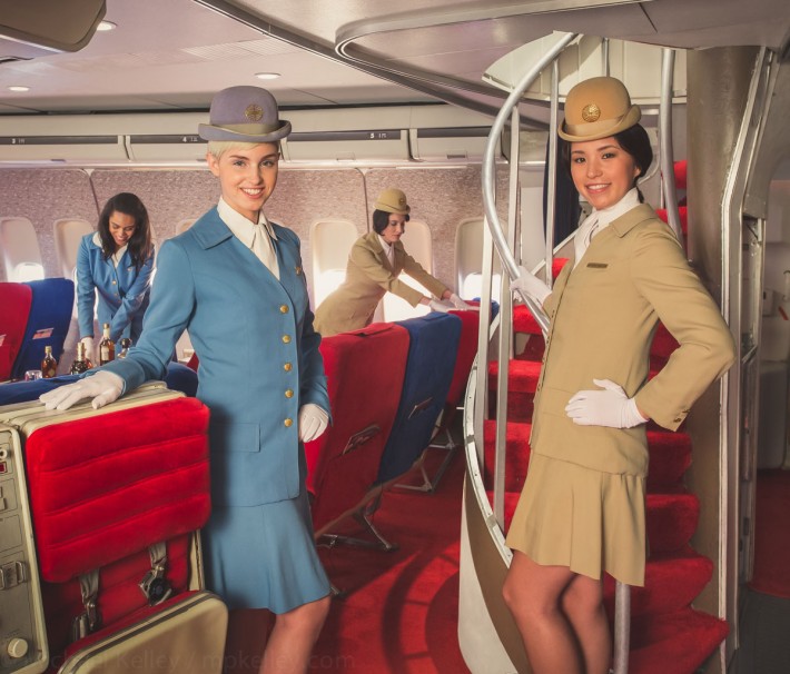 First class passengers are welcomed on board through a private jetway and led to their seats in the forward cabin.